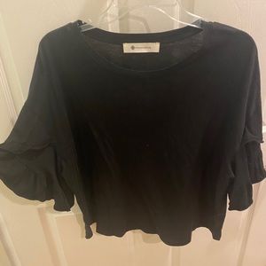 Black top with ruffle sleeves